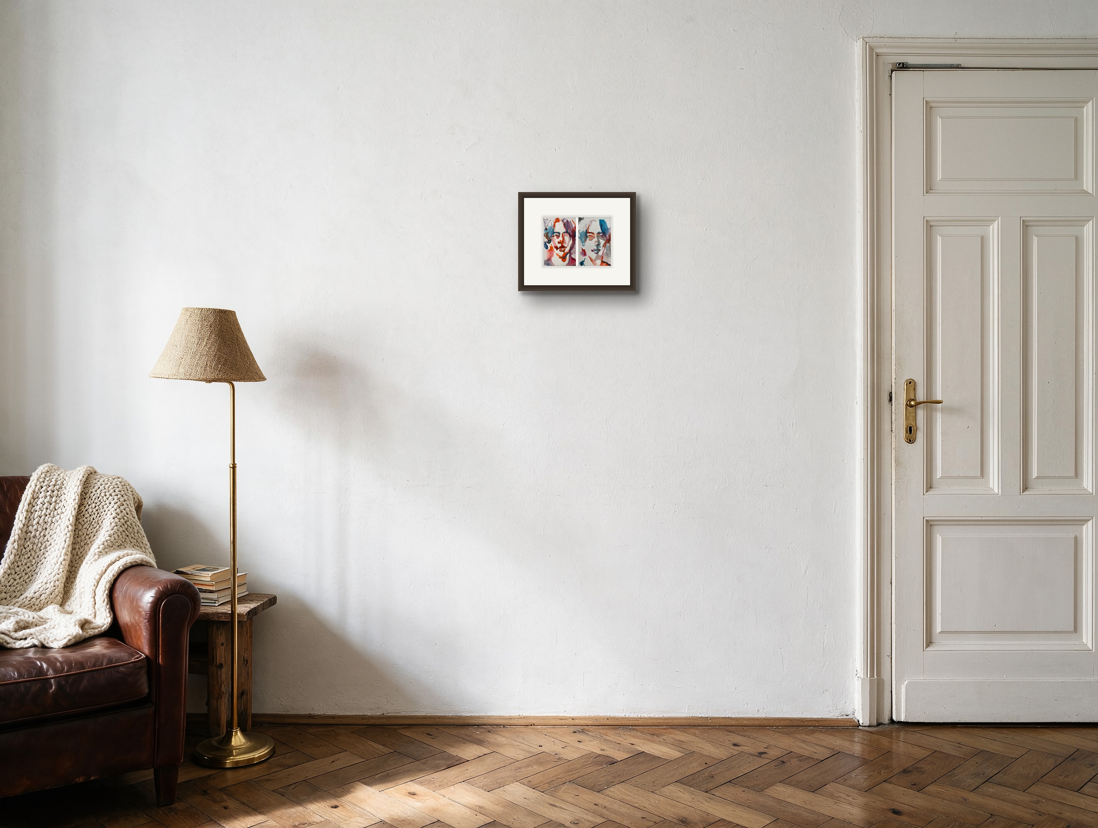 Self Portrait (set of two) shown at actual scale beside a door — digital visualization